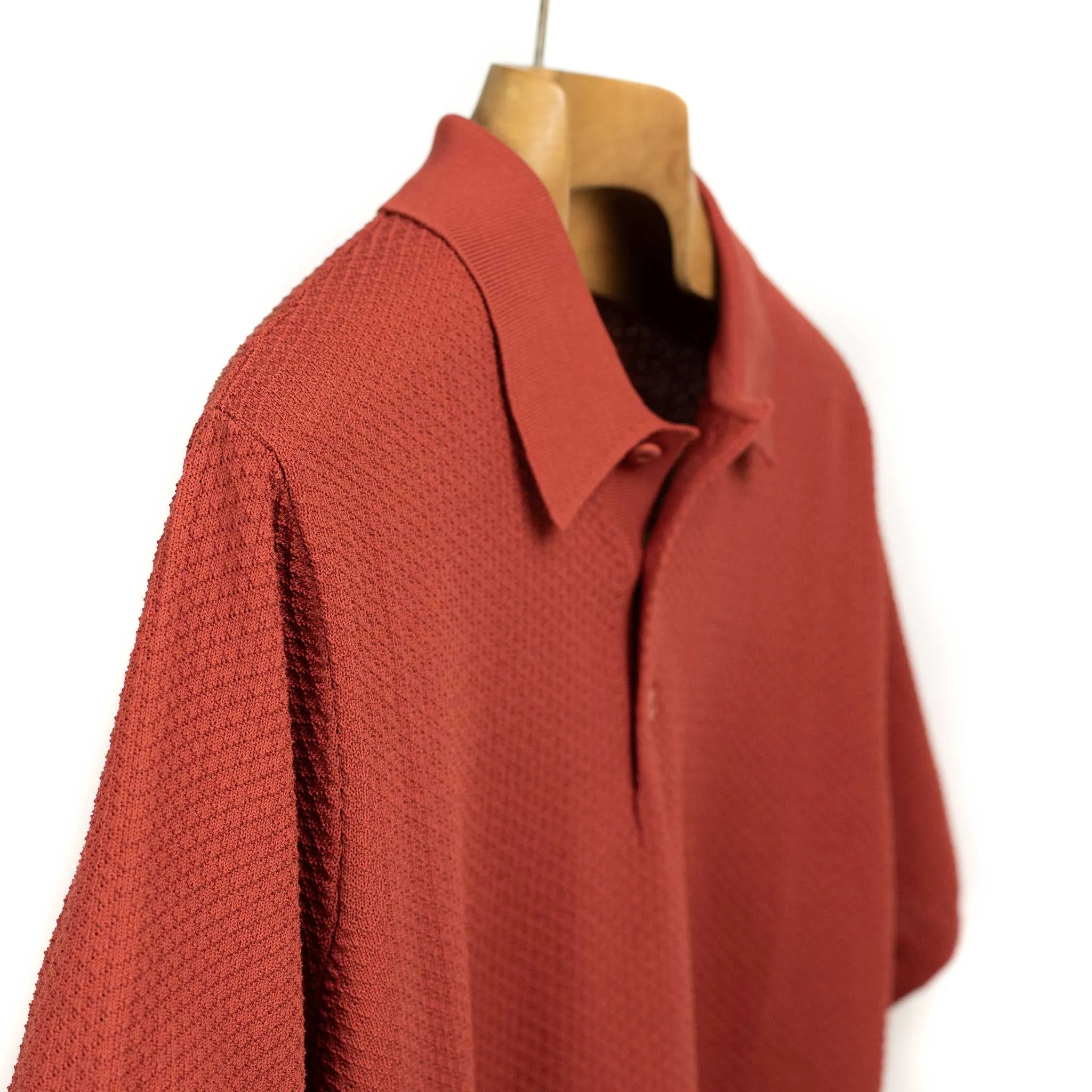 Knit short sleeve polo in brick red mini diamond pattern cotton