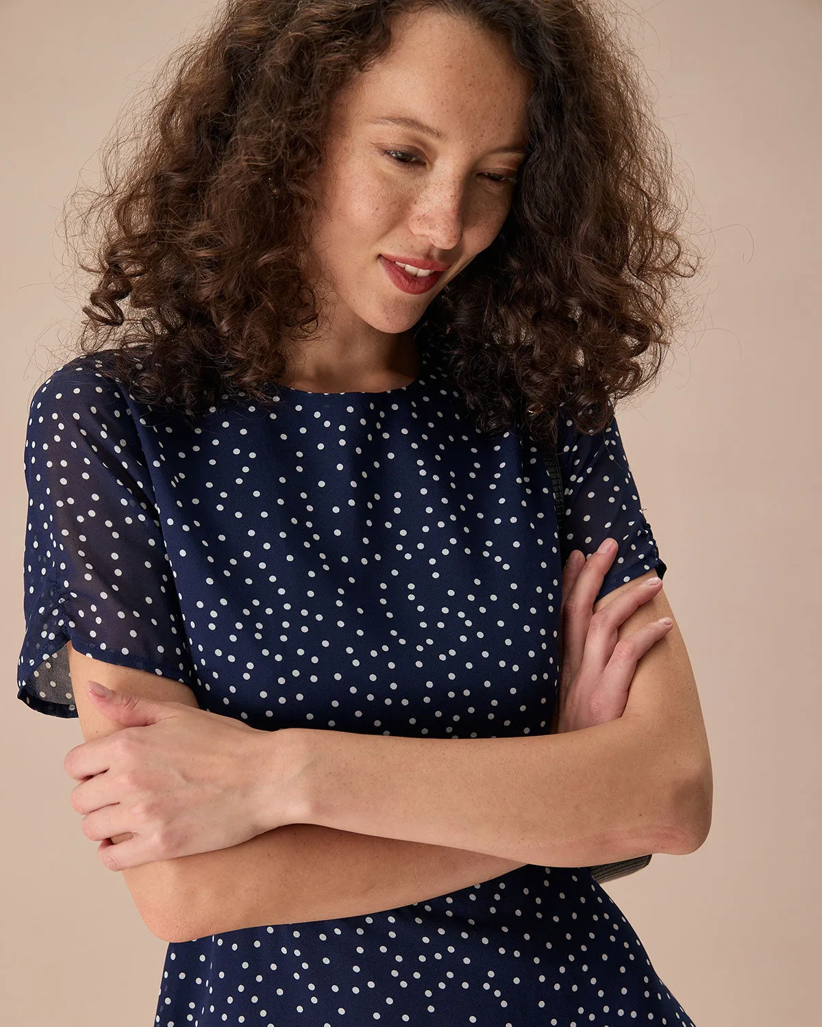 The Navy Crew Neck Polka Dot Cutout Mini Dress